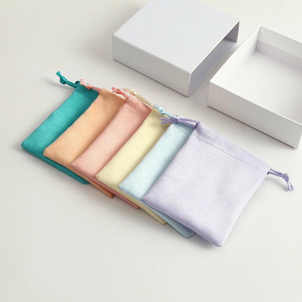 50pcs 7x9cm Light Blue Flannel Drawstring Packing Jewelry Packaging Display Luxury Velvet Suede Pouches Wedding Favors Gift Bags