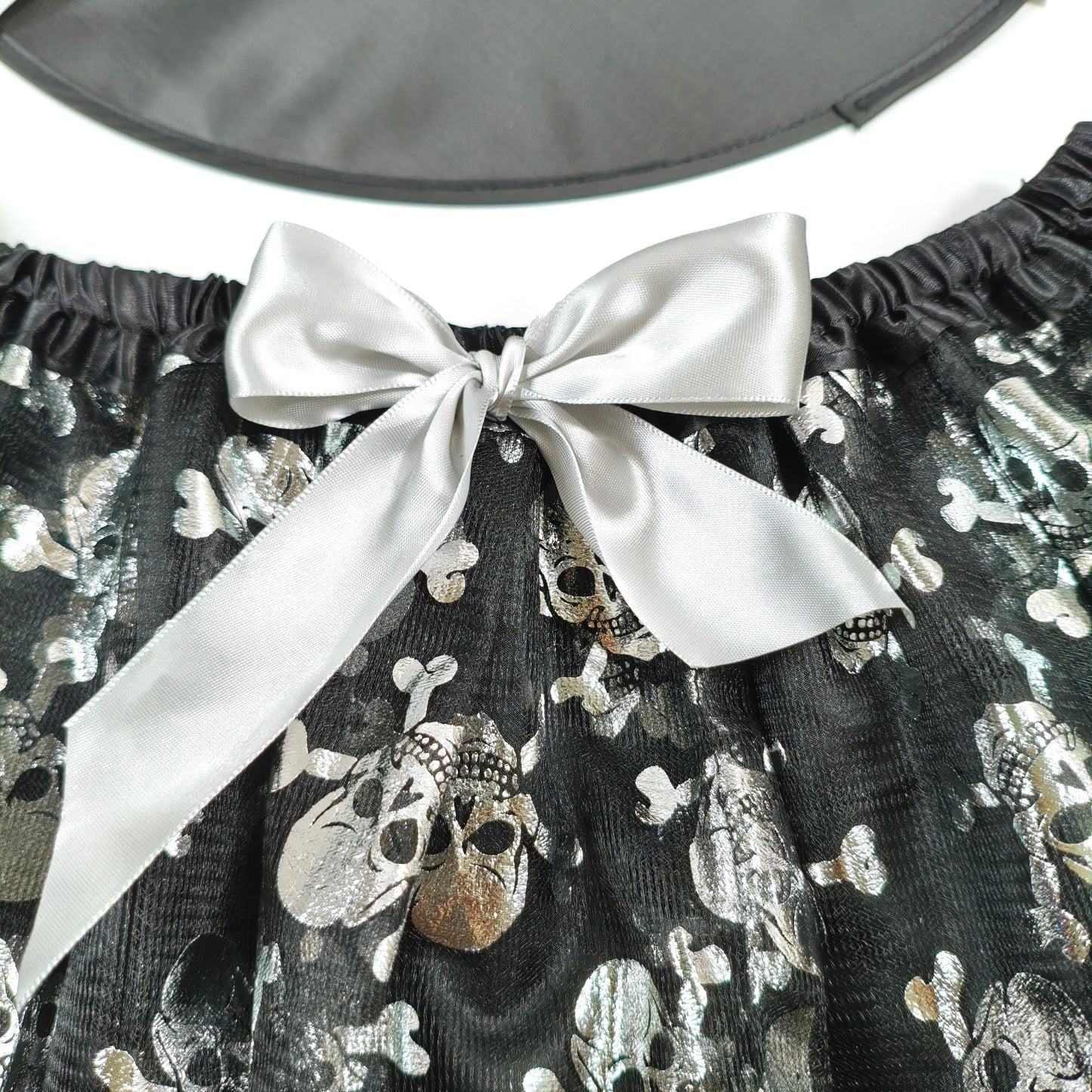 Halloween Adults Tulle Skirt Adorned with bats pumpkins stars this orange tulle skirt has a black bow waist  trim