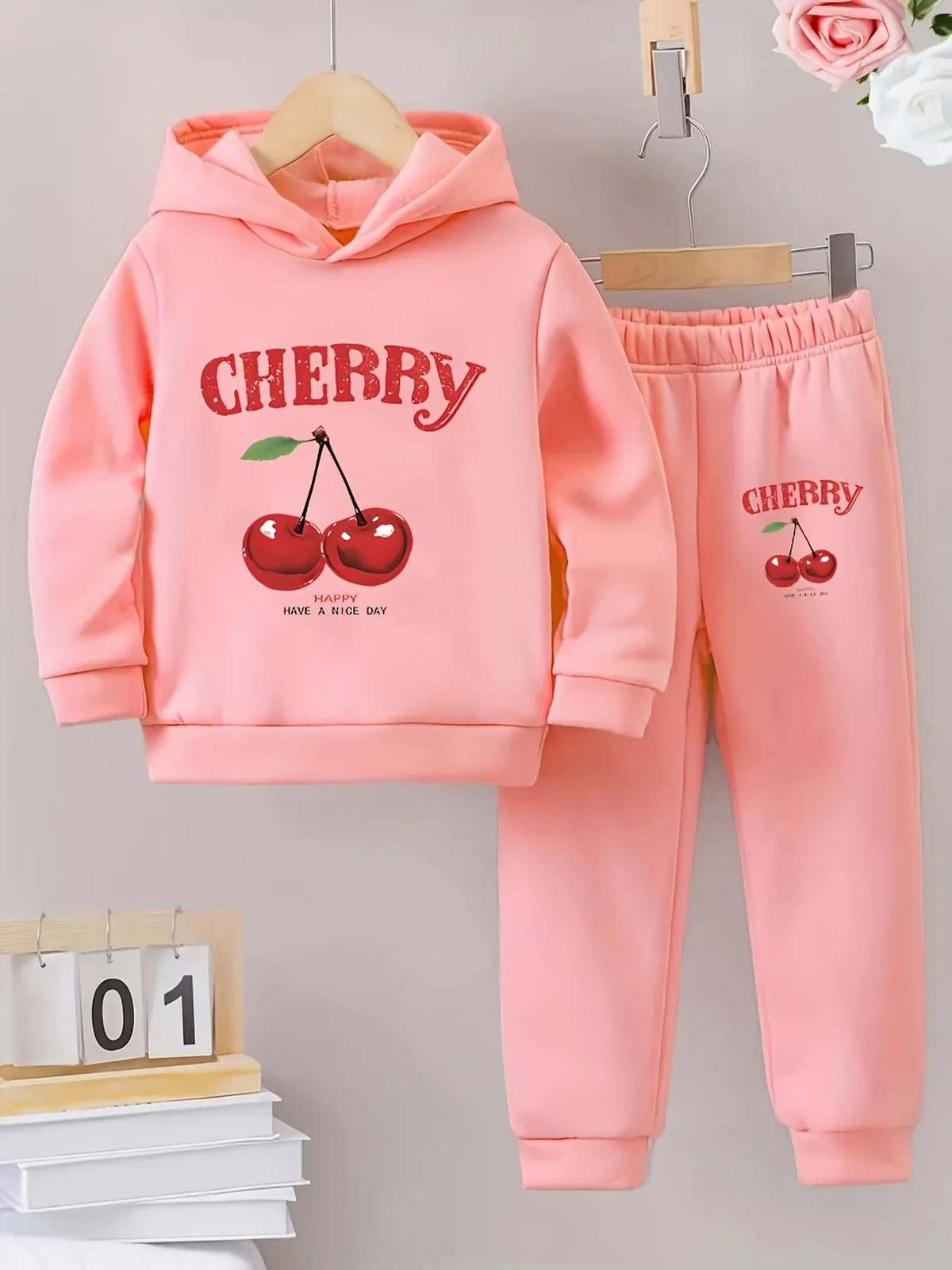 A two-piece set of cute cherry English printed fleece hoodie and pants for newborn girls in autumn and winter