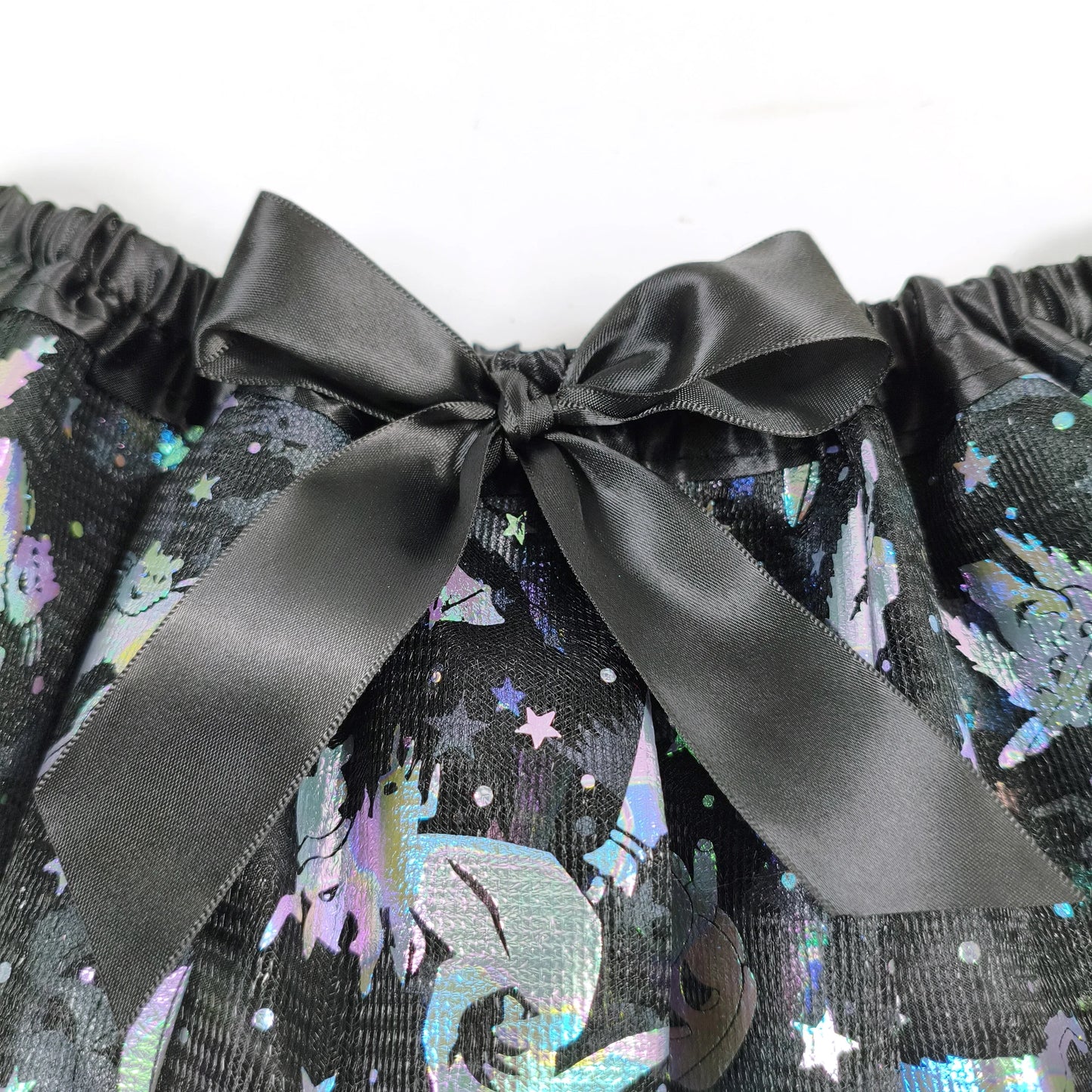 Halloween Adults Tulle Skirt Adorned with bats pumpkins stars this orange tulle skirt has a black bow waist  trim