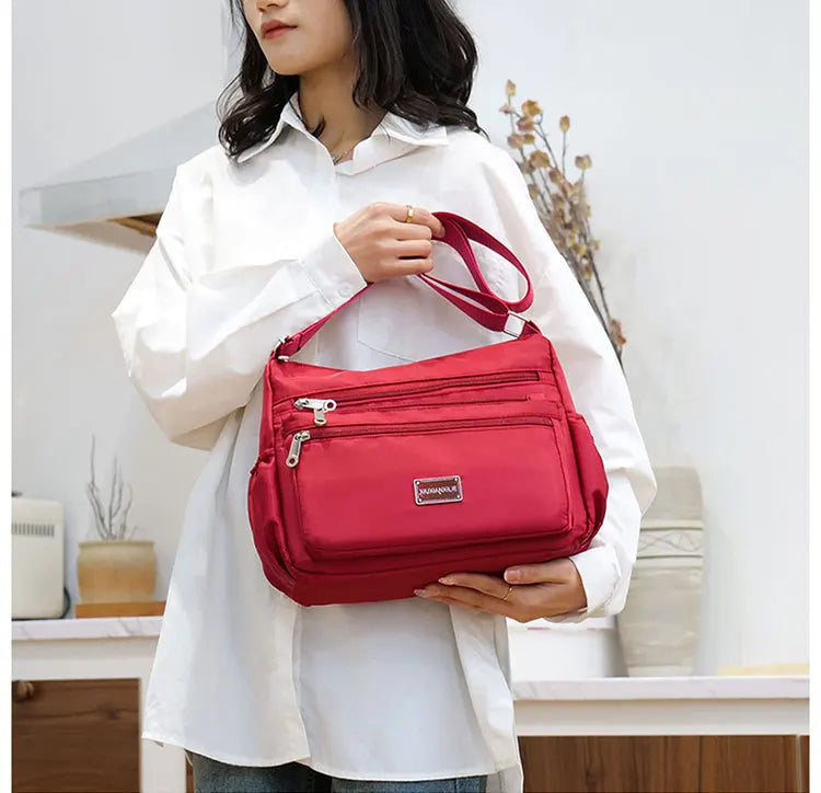2025 Bag Women's Large Capacity Shoulder Bag Waterproof and Wear Resistant Multi Pocket Commuter Leisure Outdoor Crossbody Bag
