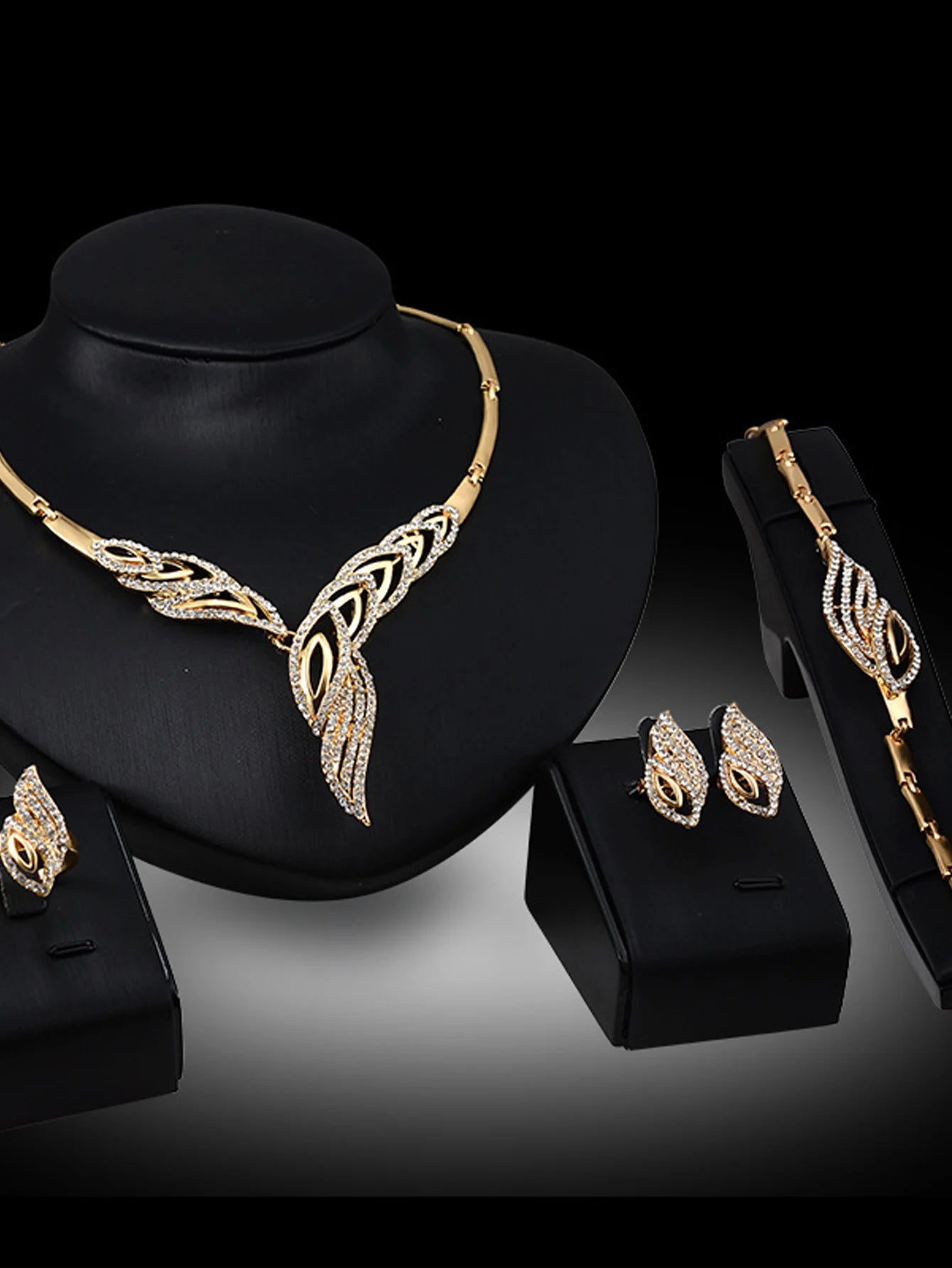 Women's fashionable design metal earrings, necklaces, bracelets, and ring sets suitable for banquets and holiday gifts