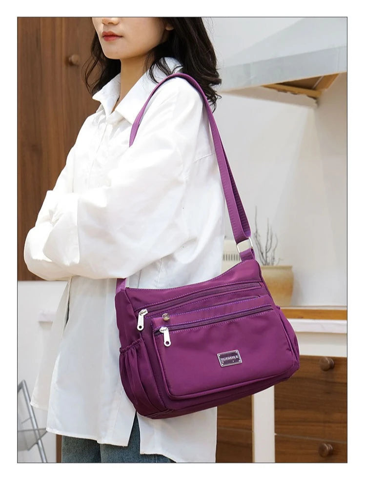 2025 Bag Women's Large Capacity Shoulder Bag Waterproof and Wear Resistant Multi Pocket Commuter Leisure Outdoor Crossbody Bag