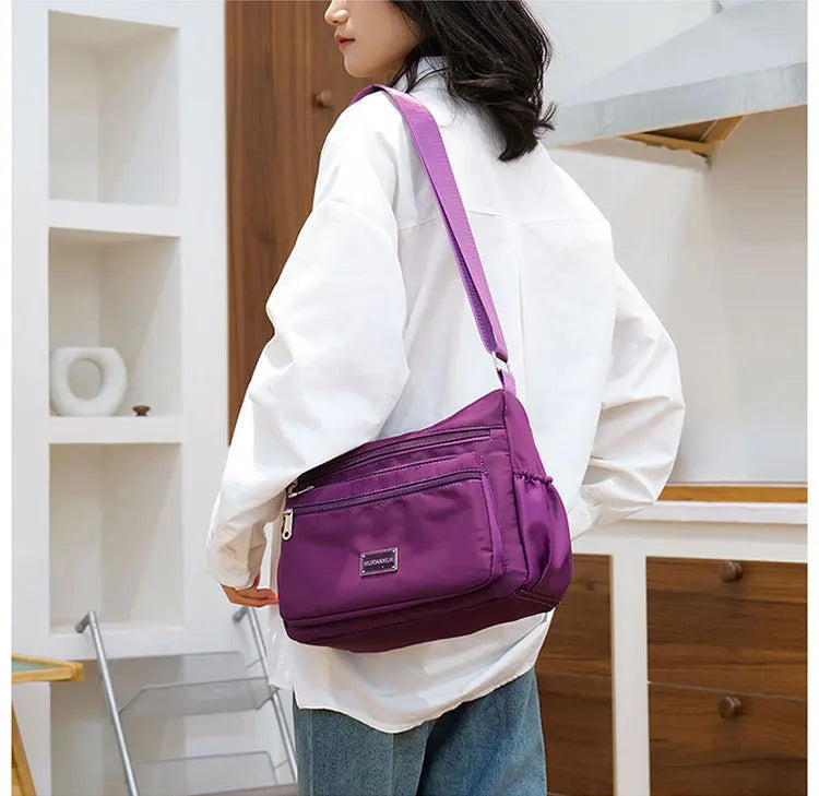 2025 Bag Women's Large Capacity Shoulder Bag Waterproof and Wear Resistant Multi Pocket Commuter Leisure Outdoor Crossbody Bag