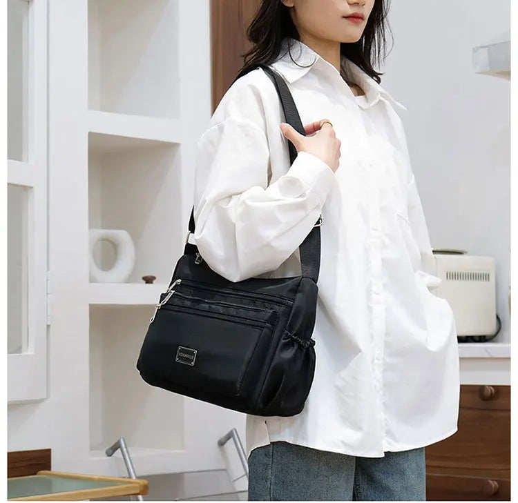 2025 Bag Women's Large Capacity Shoulder Bag Waterproof and Wear Resistant Multi Pocket Commuter Leisure Outdoor Crossbody Bag