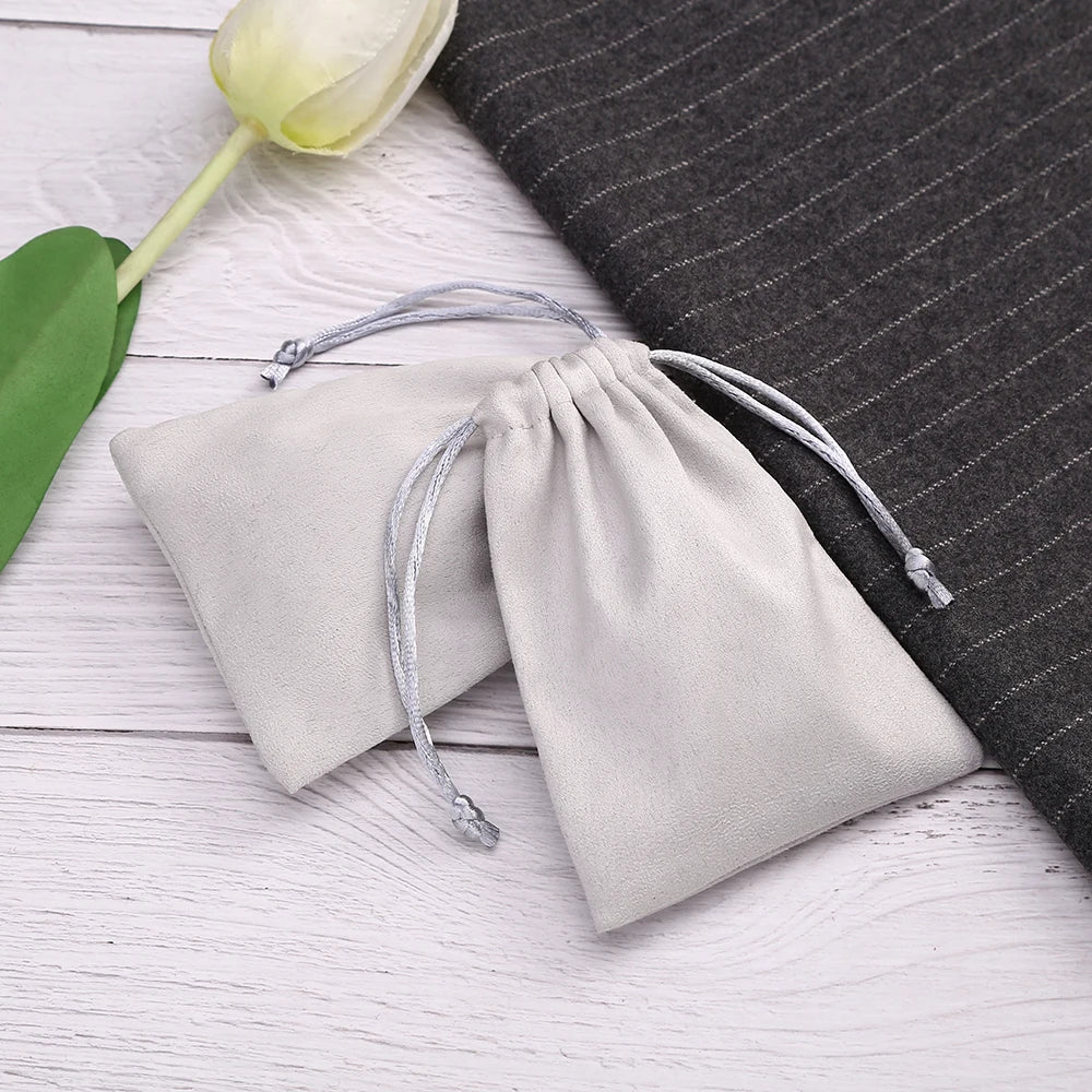 50pcs 7x9cm Light Blue Flannel Drawstring Packing Jewelry Packaging Display Luxury Velvet Suede Pouches Wedding Favors Gift Bags