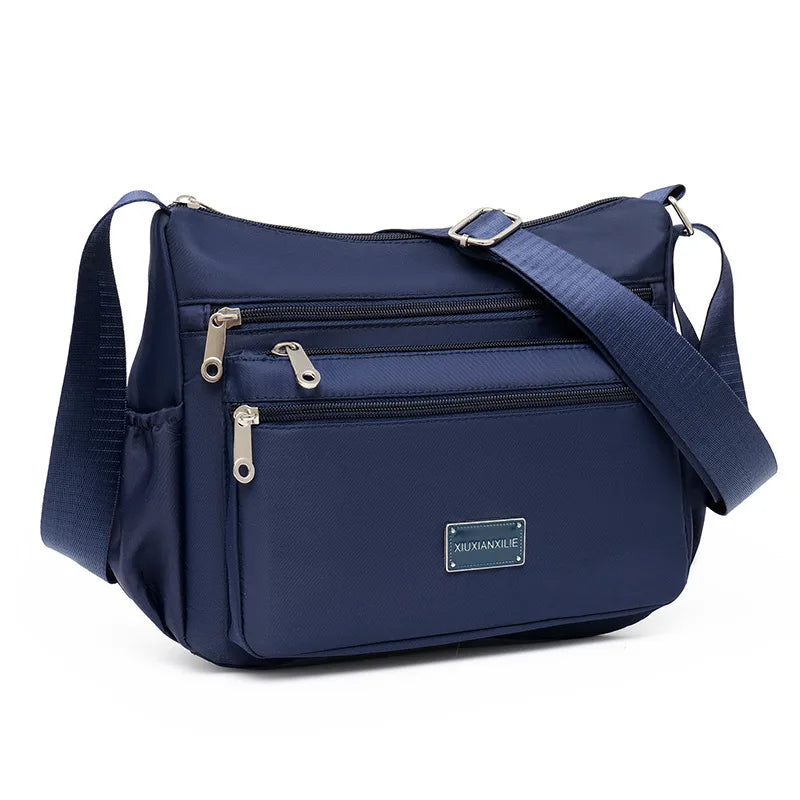 2025 Bag Women's Large Capacity Shoulder Bag Waterproof and Wear Resistant Multi Pocket Commuter Leisure Outdoor Crossbody Bag