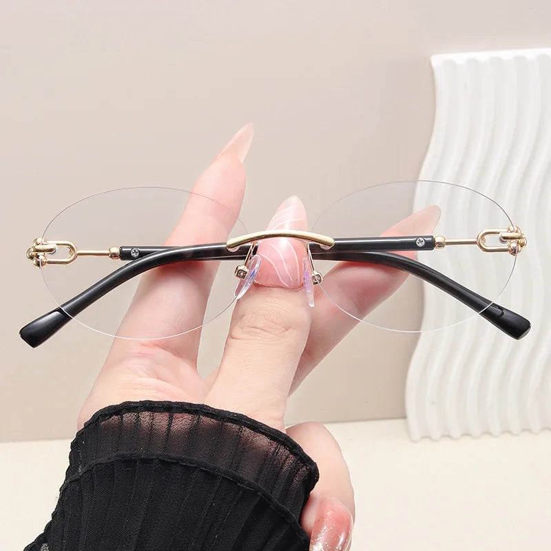 Rimless Small Round Cat Eye Sunglasses for Women Fashion Circle Frame Alloy Sun Glasses Ladies Elegant Casual Travel Glasses