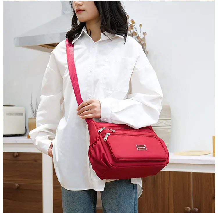 2025 Bag Women's Large Capacity Shoulder Bag Waterproof and Wear Resistant Multi Pocket Commuter Leisure Outdoor Crossbody Bag