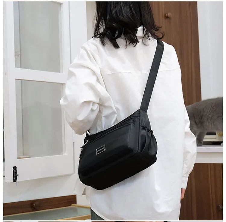 2025 Bag Women's Large Capacity Shoulder Bag Waterproof and Wear Resistant Multi Pocket Commuter Leisure Outdoor Crossbody Bag