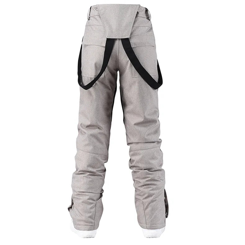 style denim ski pants suspenders denim ski pants men's skating snowboard waterproof, windproof and warm ski pants