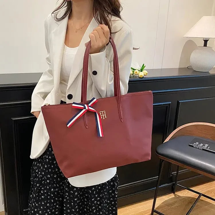 Vintage Elegant Diaper Bag: Luxury Crossbody Handbag For Women With Designer Letter Logo And Large Capacity Tote Function