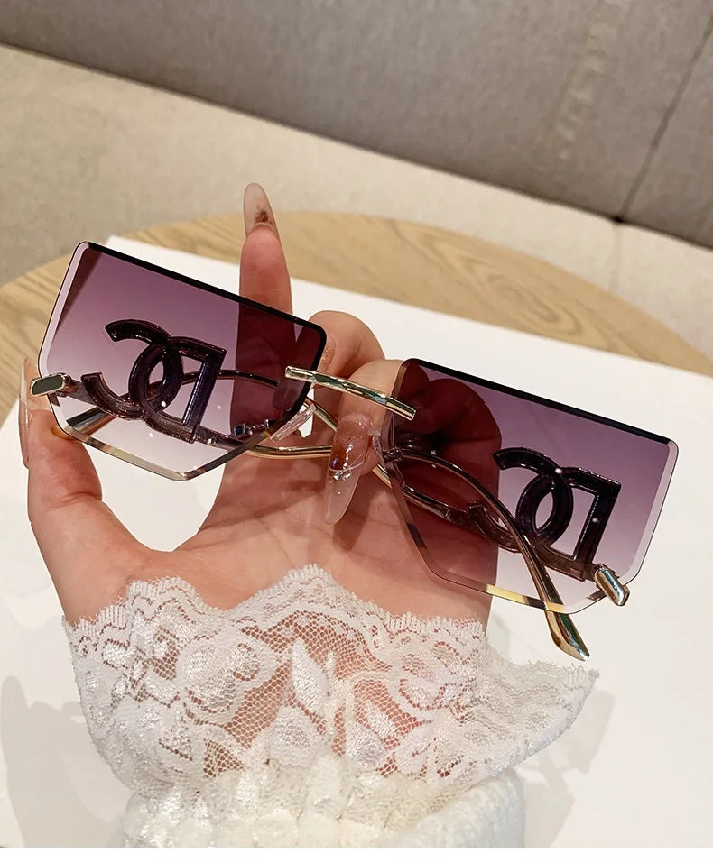 Luxury Rimless Brand Fashion Sunglasses For Women And Men Stylish Square Metal Sun Glasses Glamour Designer Shades UV400