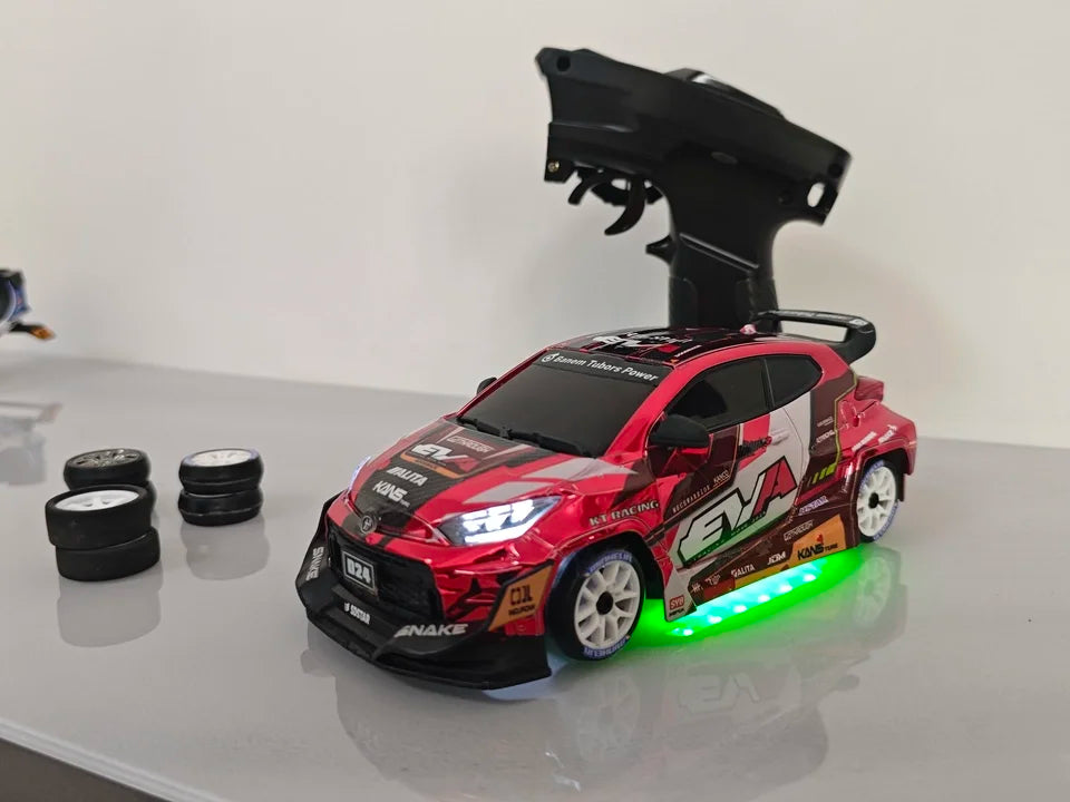 Hongxing 1 24 RC 4WD High Speed Drift Car Full Scale Gyroscope With Lithium Battery 2 Sets Of Wheels Independent Shock Absorber