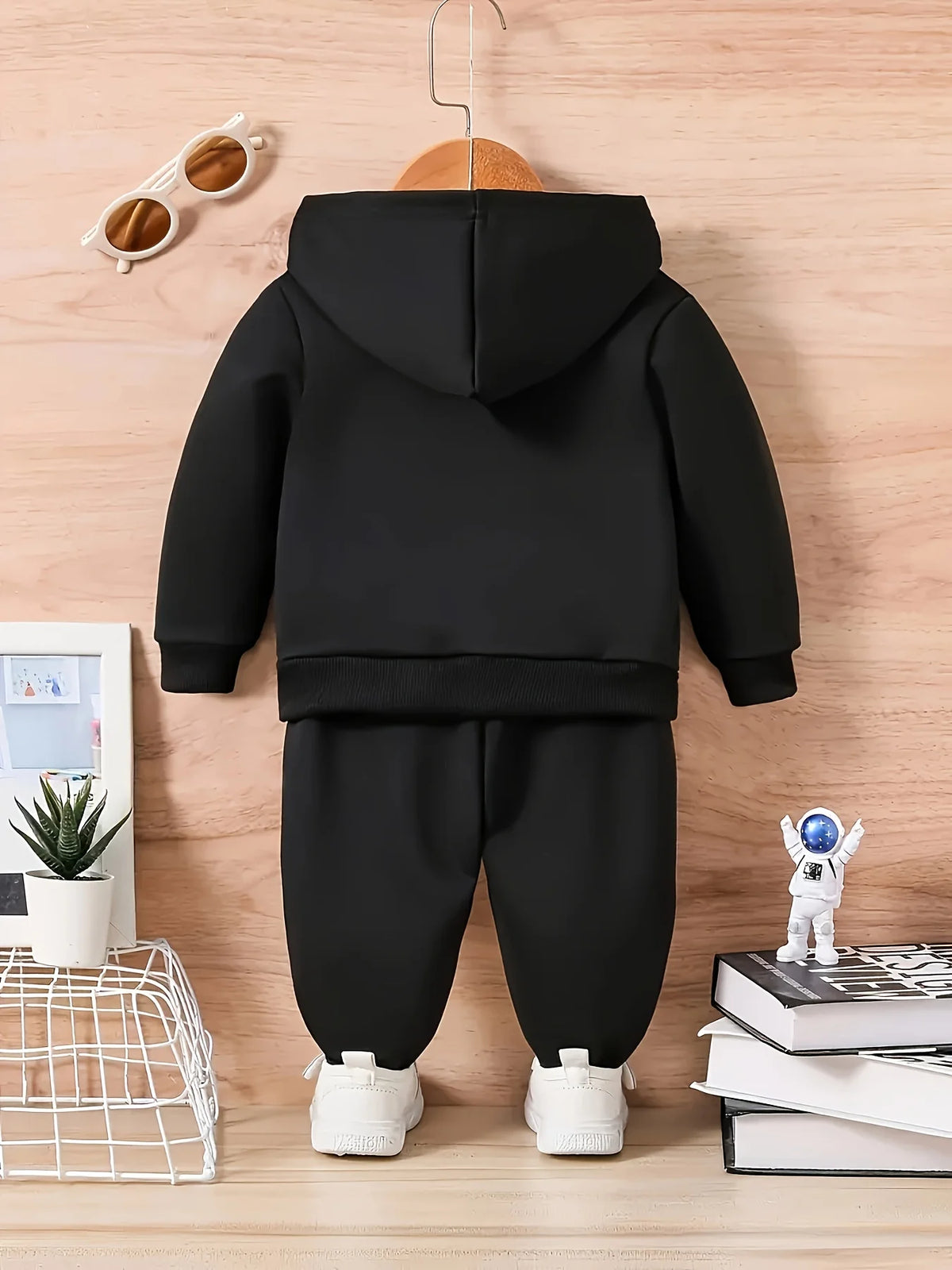 A two-piece cartoon printed fleece hoodie and long pants set for a newborn baby boy in autumn and winter