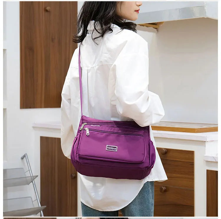 2025 Bag Women's Large Capacity Shoulder Bag Waterproof and Wear Resistant Multi Pocket Commuter Leisure Outdoor Crossbody Bag